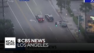 Police in pursuit of a suspect near the Hollywood Hills