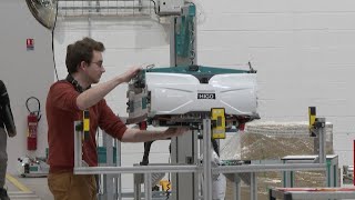 French company builds shelf-climbing robots to improve efficiency