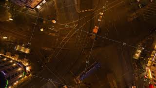 AERIAL: Beautiful Aerial Drone Time Lapse of Busy intersection at night in Berlin, Germany with city