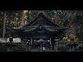 the snow capped silver alps. kozenji temple in late autumn