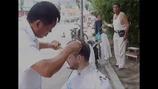 $4 Haircut on the street in China