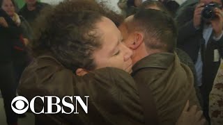 CBSN Exclusive: Separated family's emotional return to U.S.