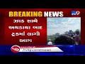 truck carrying oil tins catches fire after tyre burst banaskantha tv9