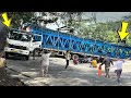 Tense, Long Loaded Truck Struggles to Pass Steep Bends