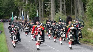 Lonach Highlanders return march through Strathdon in Scotland during 2023 Lonach Gathering