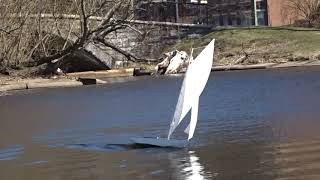 Herreshoff NY-30 model sailing in Boston on the Esplanade