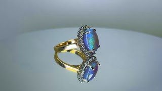 18kt and Platinum cluster Black Opal 4.73ct and Diamond ring