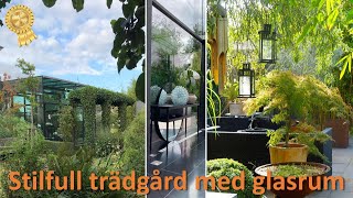 Modern lummig trädgård med glashus, trädgårdsinspiration, trädgårdsdesign, öppenträdgård, uterum