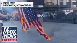 Anti-Israel protesters burn US flag, chant 'death to America!'
