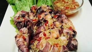 Steamed shrimp stuffed squid ( បង្គាញាត់មឹកចំហុយ )Khmer food