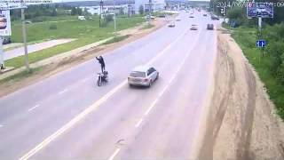 LiveLeak.com - Motorcycle rider likes to show off in traffic, until this happens