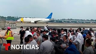Frustrados llegan a Guatemala migrantes deportados | Noticias Telemundo