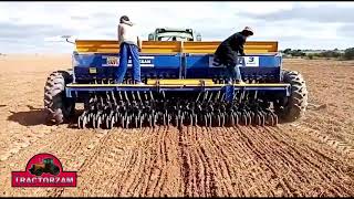 29 row TATU planter deep in action