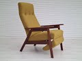 70s, completely reupholstered Danish high-backed armchair with fold-out footrest