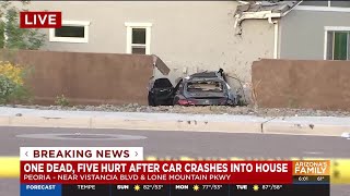 1 dead, 5 hospitalized after car slams into Peoria home