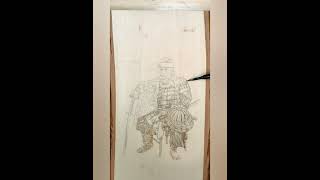 Wood burning of a samurai sitting like a boss