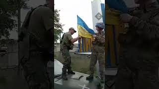 Ukrainian soldiers raise flag in Lyman, Donetsk region