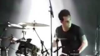 Brendon urie playing drums to a song by Bruno mars