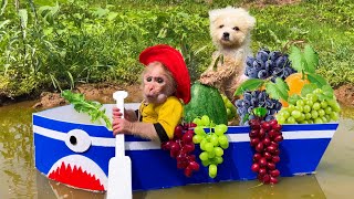 Bu Bu rowes a boat to pick fruit for Amee dog