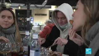 'It's liberating to be in a restaurant': French tourists escape to Madrid