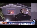 'It's just devastating': Southern California home heavily damaged after car lands on balcony