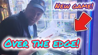 New Game!  Winning prizes on Over The Edge marble and box pusher!!!