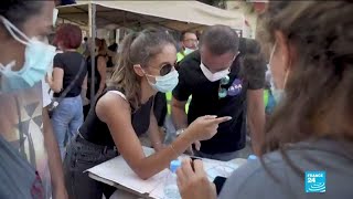 Beirut blast: Volunteers help clean up debris left by explosion