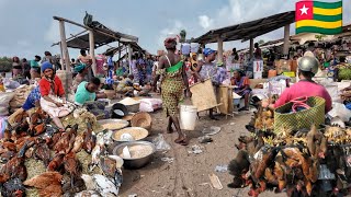 RURAL VILLAGE MARKET DAY IN TOGO/ BENIN BORDERS WEST AFRICA.