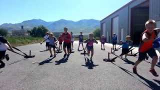 CrossFit Kids Pulling Sleds at CrossFit IoTA