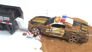 Toy Police Cars stuck in the mud and go to the car wash video