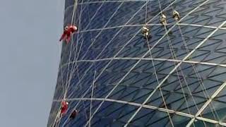abudhabi capital gate we work glass cleaning by rope. .