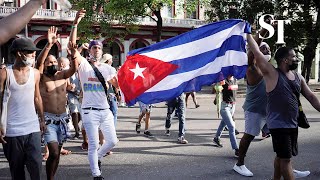 Thousands of Cubans march against government