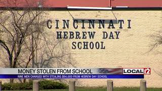 9 men charged with stealing thousands of dollars from local school