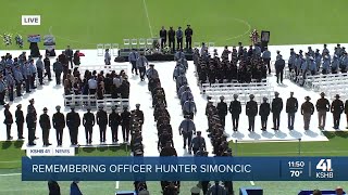 Funeral attendees file out