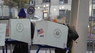 Voters arrive at polls in New York City