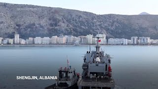 Italian navy ship takes back 43 migrants after third failed attempt to process them in Albania