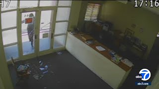 Video shows suspect throwing rock through glass door in attempted break-in at Vernon paper business