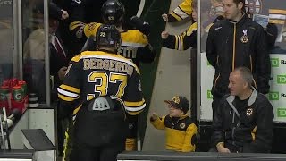 Young Bruins Fan Fist Bumps His Favorite Team