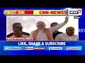 pm modi in gujarat today pm modi holds a mega roadshow in chhota udepur english news news18