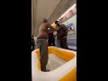 homeless man takes a shower on nyc train