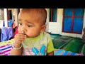 baby eating mango