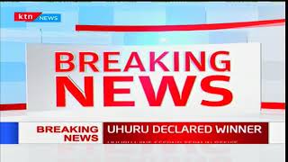 President Uhuru Kenyatta and DP William Ruto receive their certificates