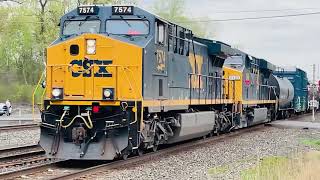 CSX 7574 leads a long westbound freight meets 2 eastbound CSX freights in kirkville