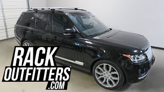 Land Rover Range Rover with Thule Rapid Crossroad AeroBlade Roof Rack Crossbars