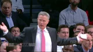 Brett Brown Grabs the Ball While Still in Play