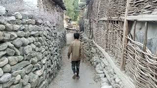 cute little boy walking street in a village گاؤں کی گلیاں