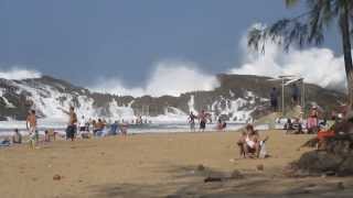 Rocks breaking waves on enclosed beach in Puerto Rico