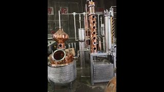 100L copper still with 4 plates bubble cap reflux column and a gin basket