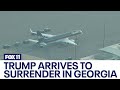 Trump arrives in Georgia to surrender