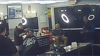 Car crashes into barber shop